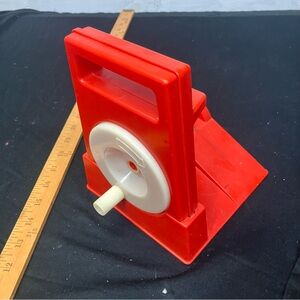 Vintage Red Plastic Handheld Tape Dispenser with White Wheel evil